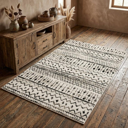 4' X 6' Ivory And Black Eclectic Patterns Indoor Area Rug