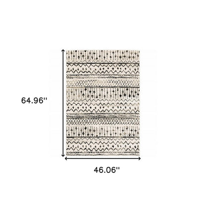 5' X 7' Ivory And Black Abstract Geometric Distressed Area Rug