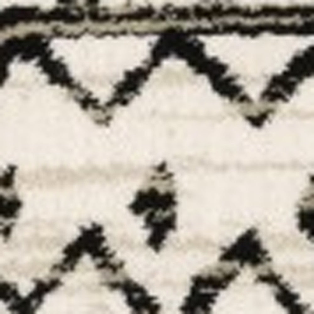 5' X 7' Ivory And Black Eclectic Patterns Indoor Area Rug