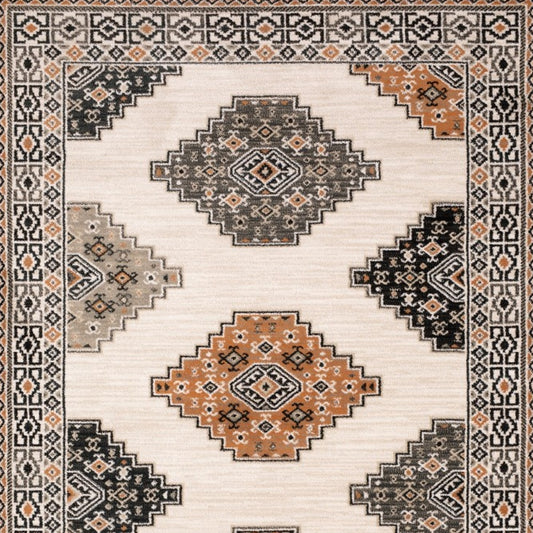 4' X 6' Ivory Black Orange And Gray Geometric Area Rug