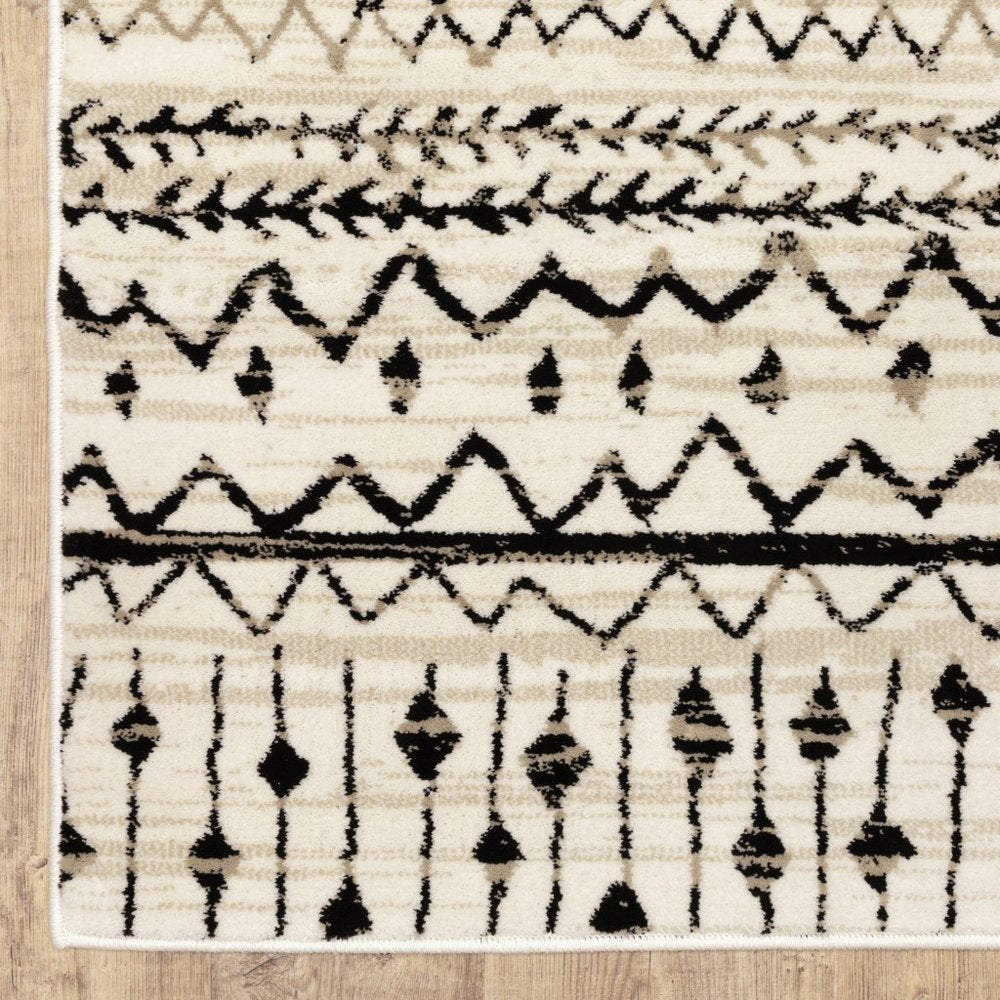 5' X 7' Ivory And Black Abstract Geometric Distressed Area Rug