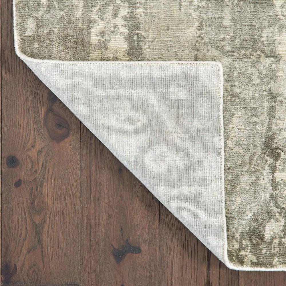 6' X 9' Gray And Ivory Abstract Hand Loomed Distressed Area Rug