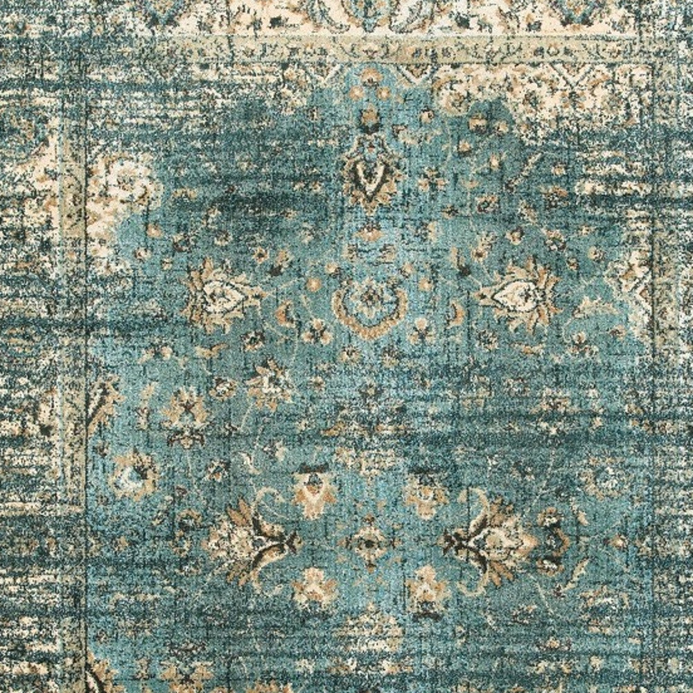 5' X 8' Peacock Blue And Ivory Indoor Area Rug