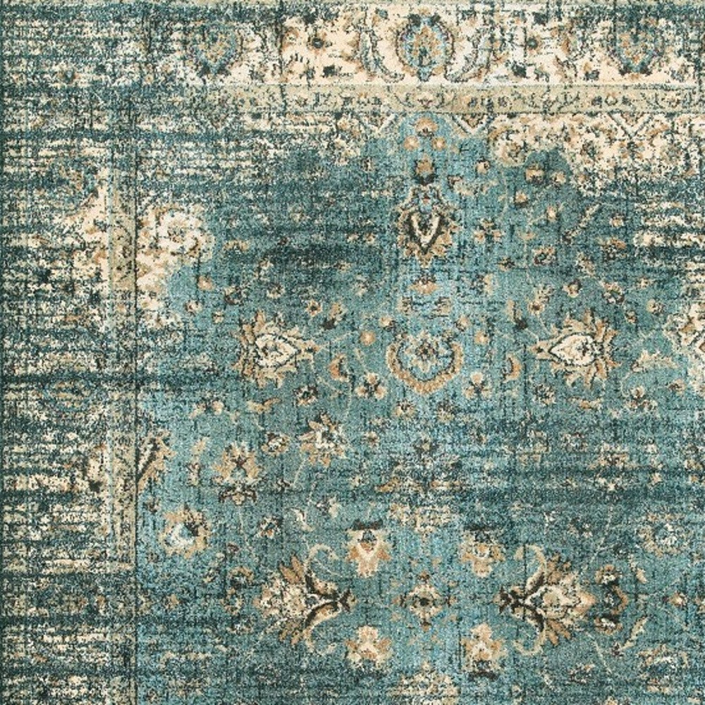 5' X 8' Peacock Blue And Ivory Indoor Area Rug