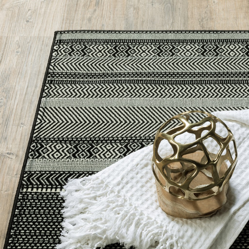 5' X 8' Black Ivory Machine Woven Geometric Indoor Area Rug