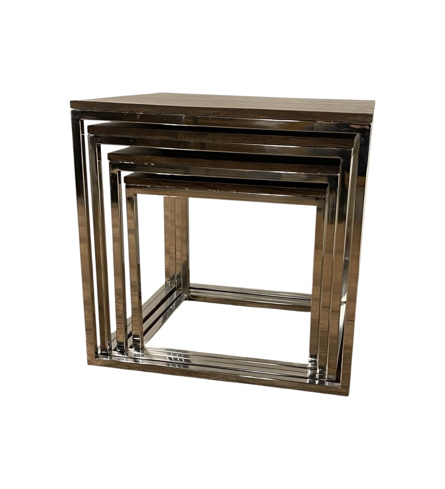Gold-tone metal nested square frames forming a decorative nesting tables set.