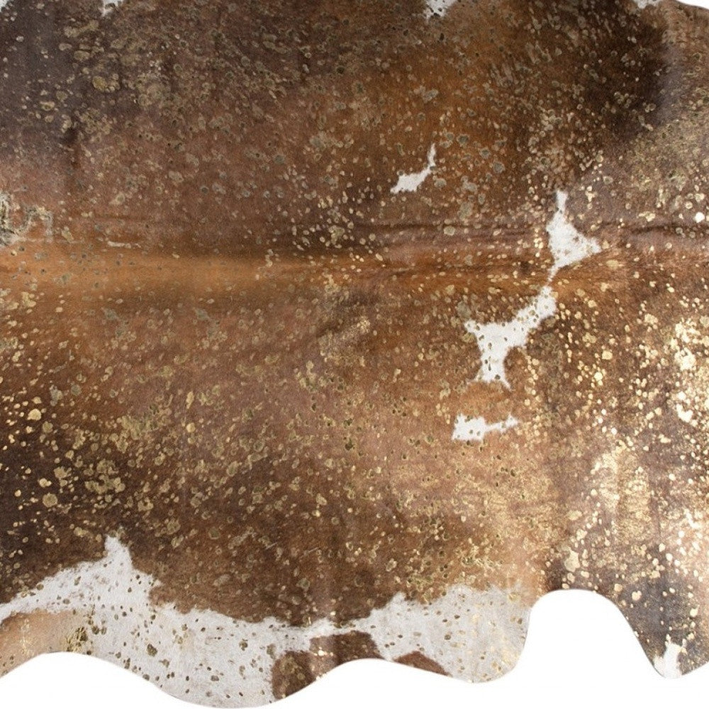 6' X 7' Brown White And Gold Natural Cowhide Area Rug