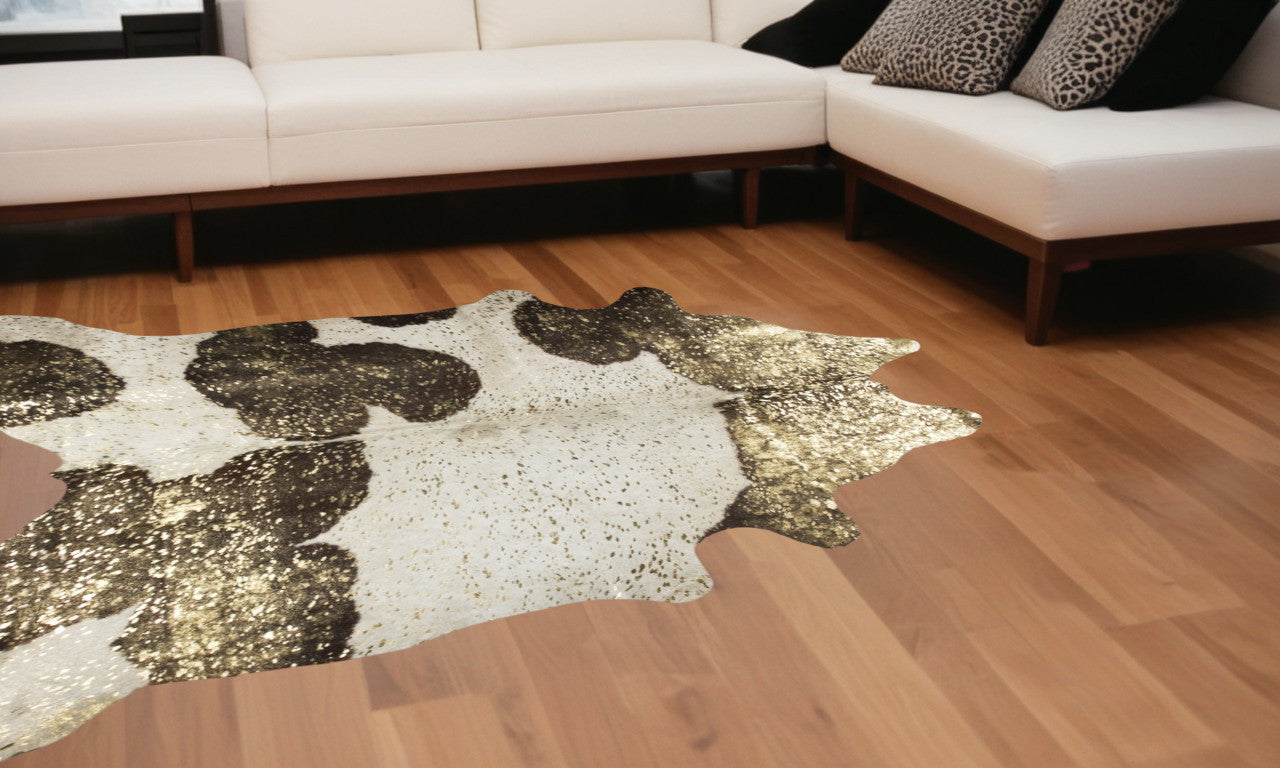 6' X 7' Dark Brown White And Gold Natural Cowhide Area Rug