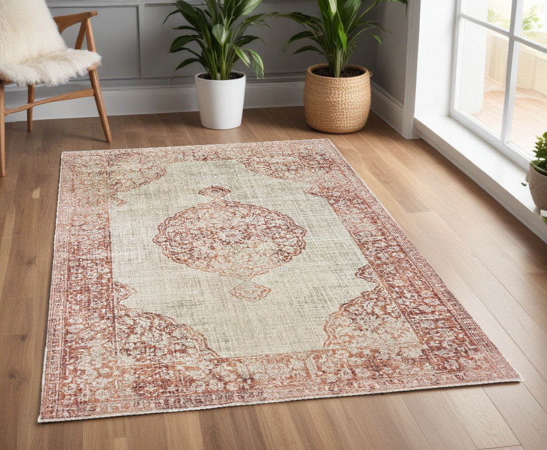 5' X 8' Ivory And Pink Medallion Area Rug