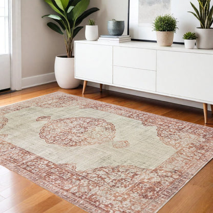 10' X 13' Ivory And Pink Medallion Area Rug