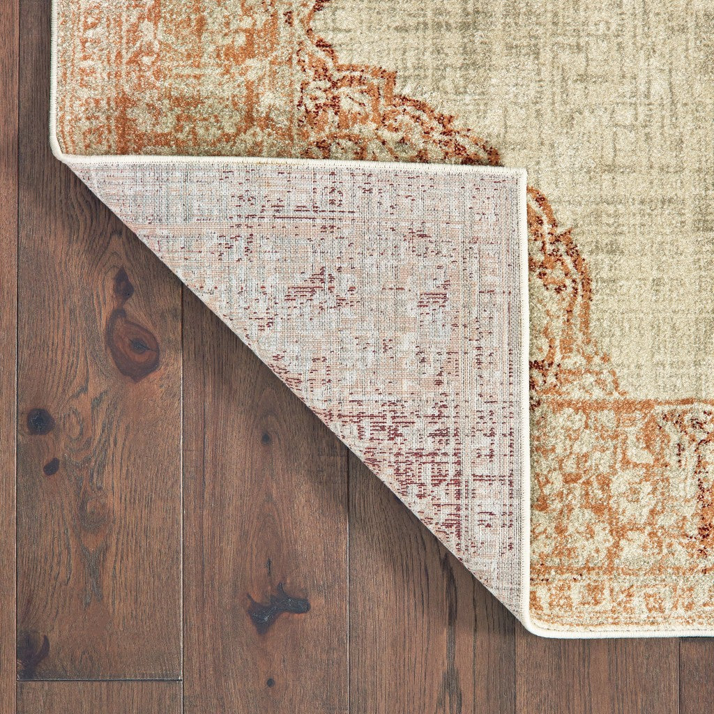 10' X 13' Ivory And Pink Medallion Area Rug