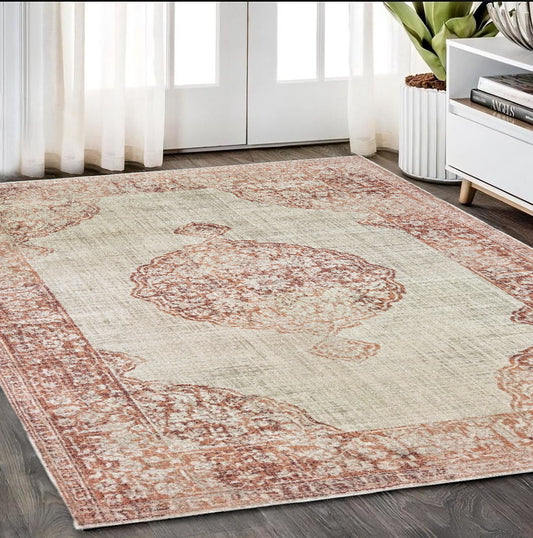 7' X 10' Ivory And Pink Medallion Area Rug