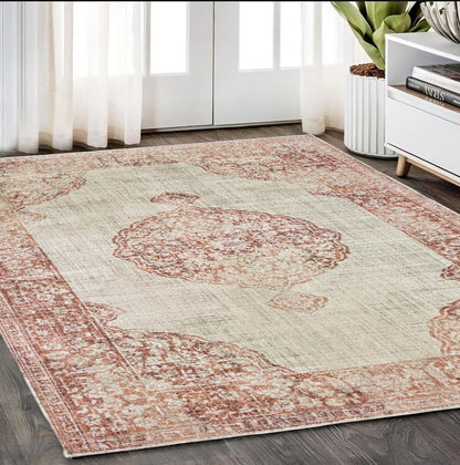 10' X 13' Ivory And Pink Medallion Area Rug