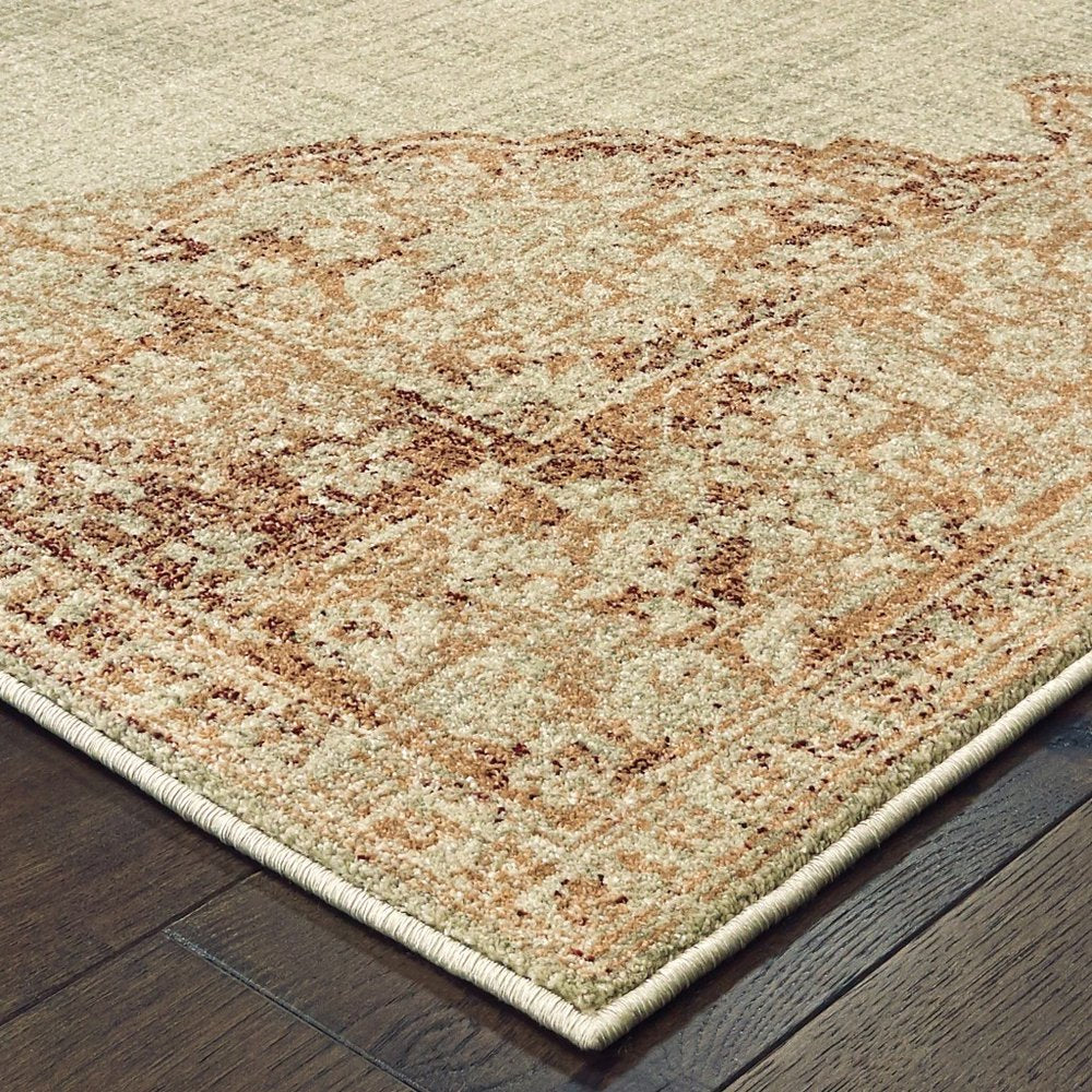 10' X 13' Ivory And Pink Medallion Area Rug
