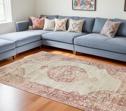 10' X 13' Ivory And Pink Medallion Area Rug