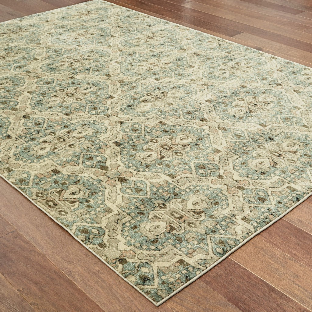 5' X 8' Ivory And Blue Geometric Area Rug