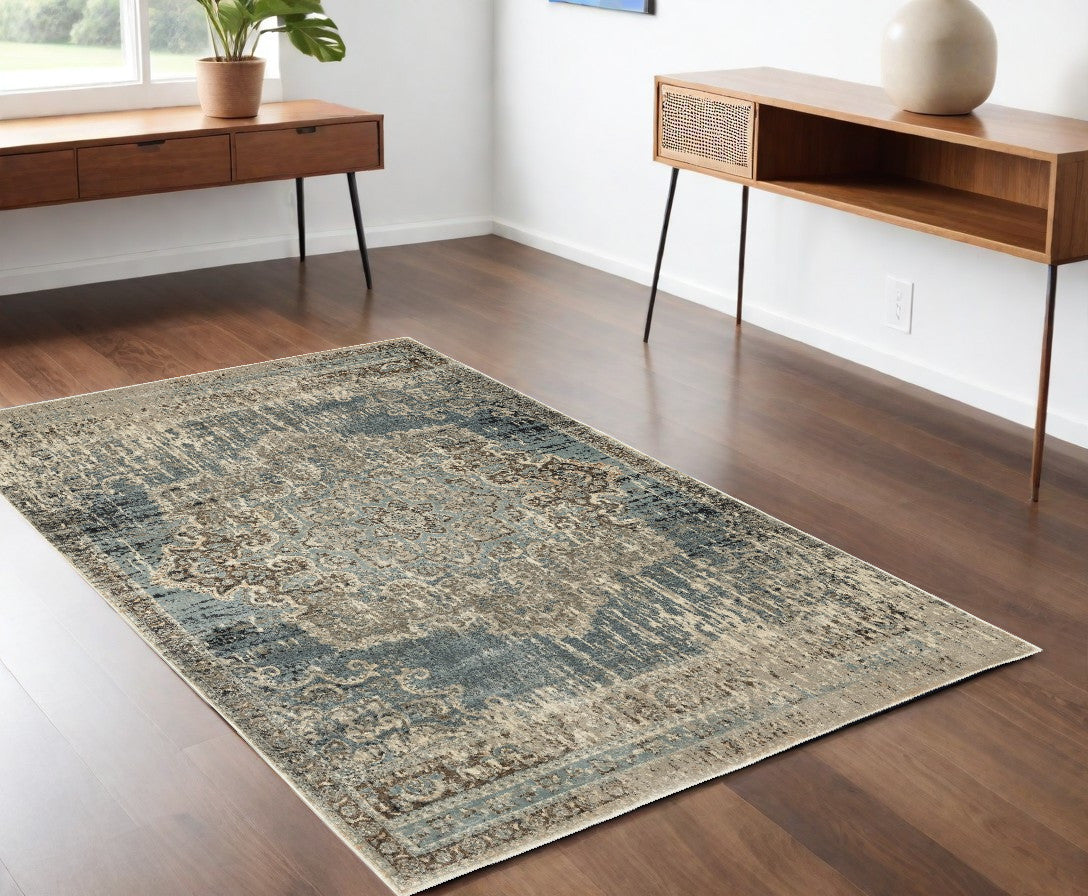 5' X 8' Blue And Ivory Medallion Area Rug