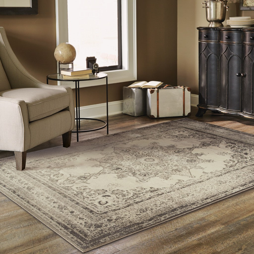 4' X 6' Ivory And Gray Pale Medallion Area Rug