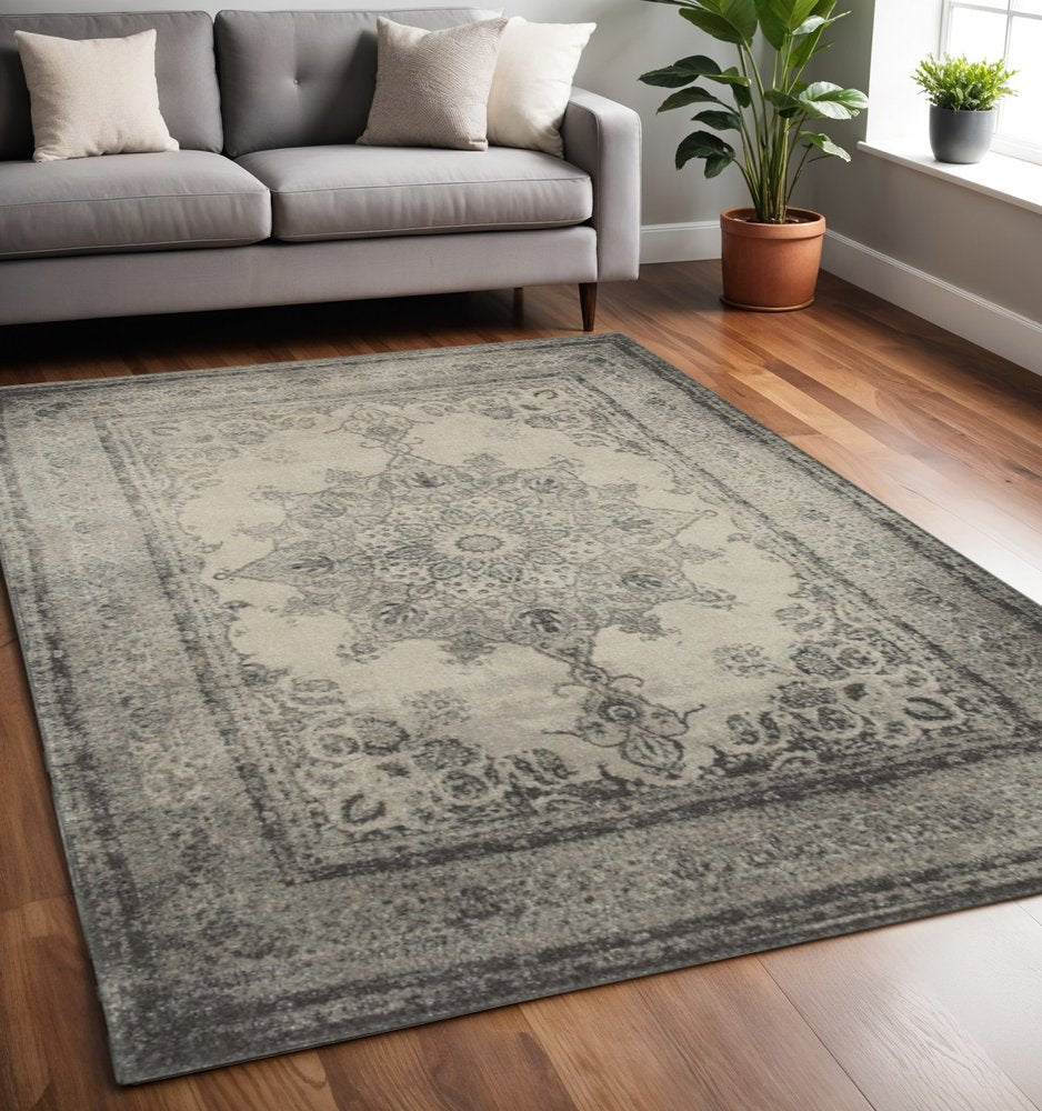 10' X 13' Ivory And Gray Pale Medallion Area Rug