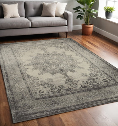 10' X 13' Ivory And Gray Pale Medallion Area Rug
