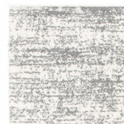 7' X 10' Ivory And Gray Abstract Strokes Area Rug
