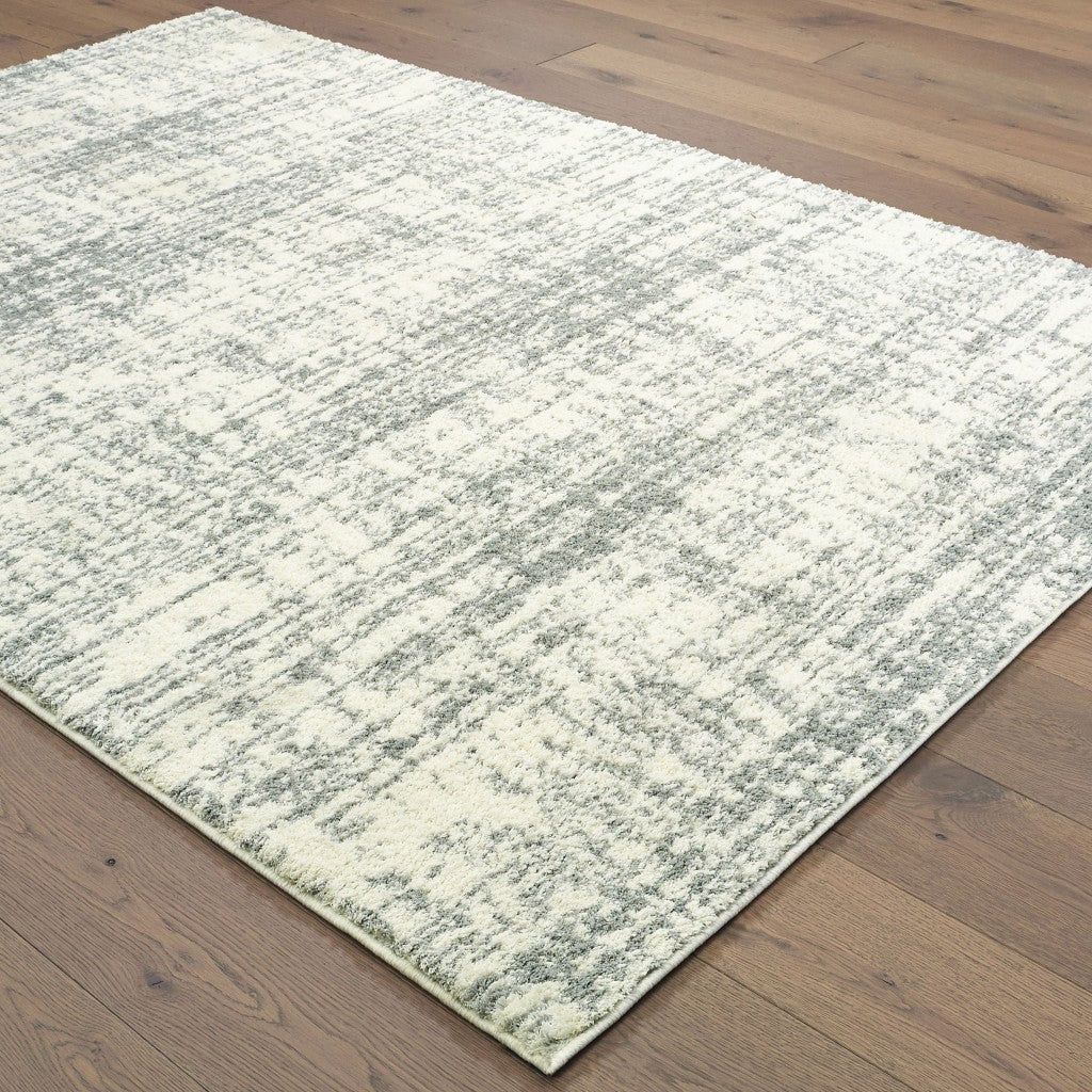 8' X 11' Ivory And Gray Abstract Strokes Area Rug