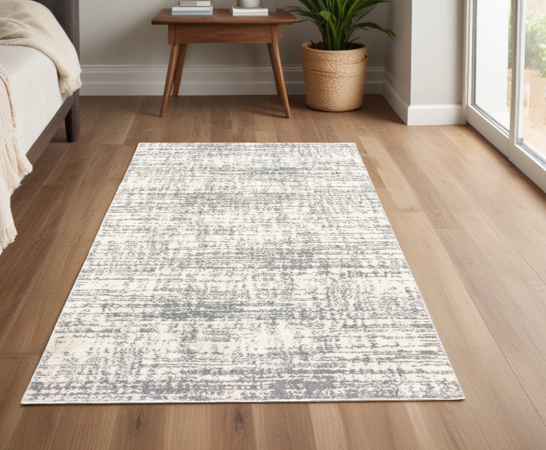 8' X 11' Ivory And Gray Abstract Strokes Area Rug