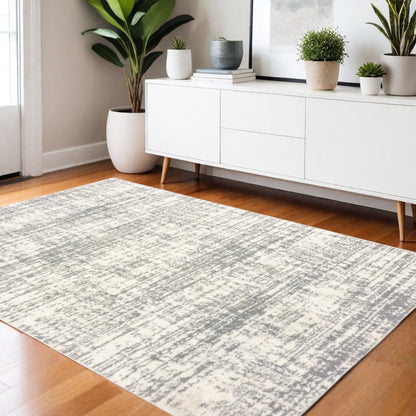 8' X 11' Ivory And Gray Abstract Strokes Area Rug