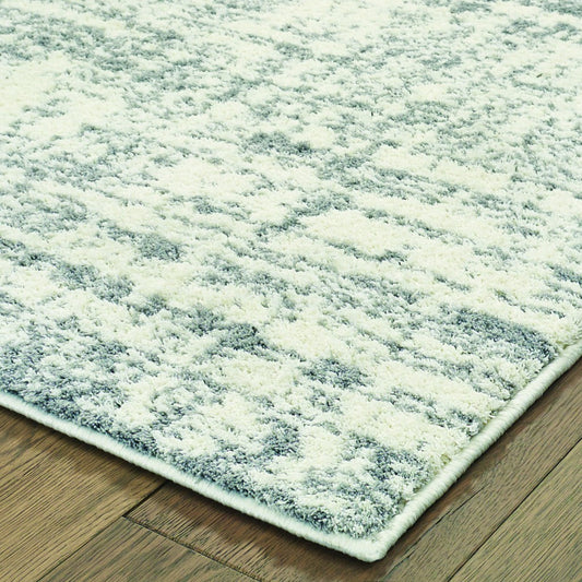 7' X 10' Ivory And Gray Abstract Strokes Area Rug