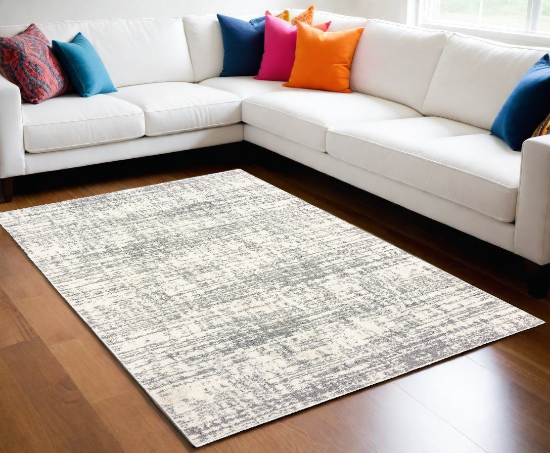 8' X 11' Ivory And Gray Abstract Strokes Area Rug