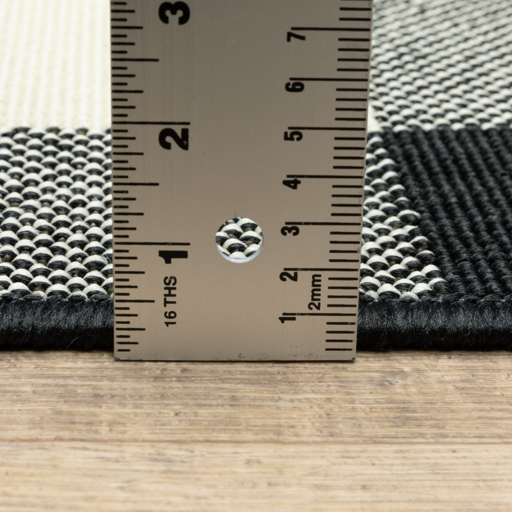 8' X 8' Black and Ivory Indoor Outdoor Area Rug