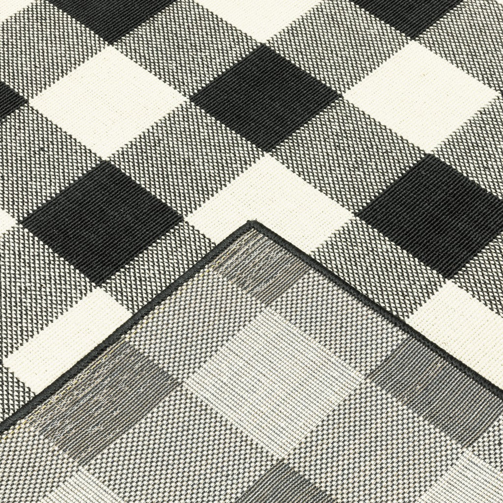 8' X 8' Black and Ivory Indoor Outdoor Area Rug