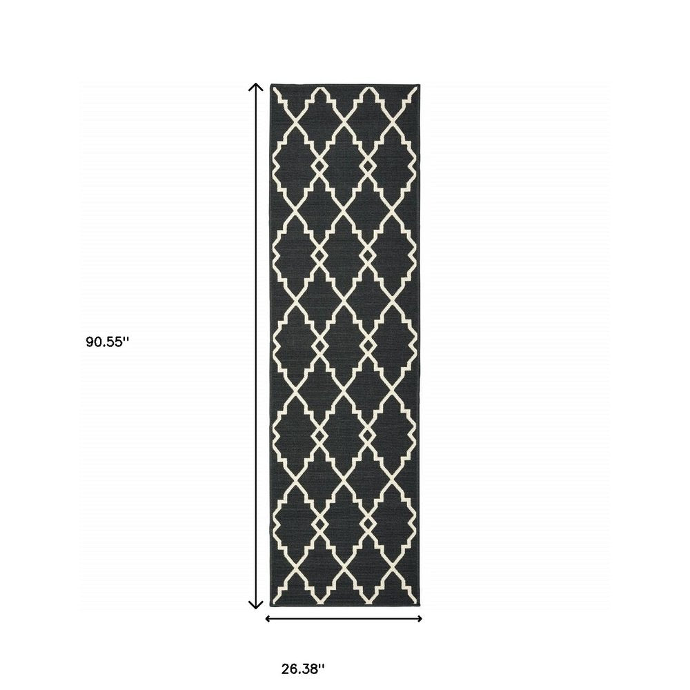 7' X 10' Black And Ivory Indoor Outdoor Area Rug