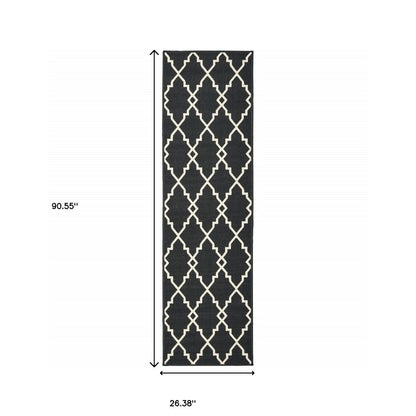 7' X 10' Black And Ivory Indoor Outdoor Area Rug