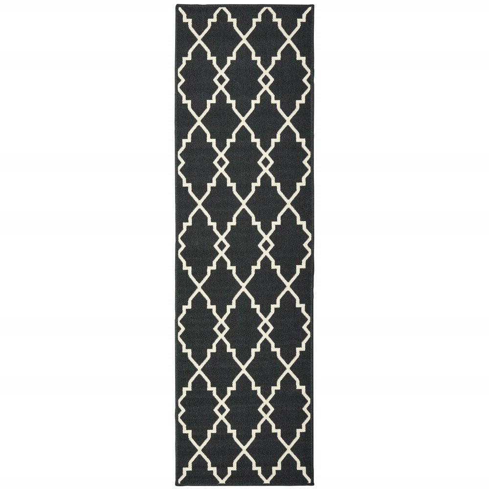 7' X 10' Black And Ivory Indoor Outdoor Area Rug