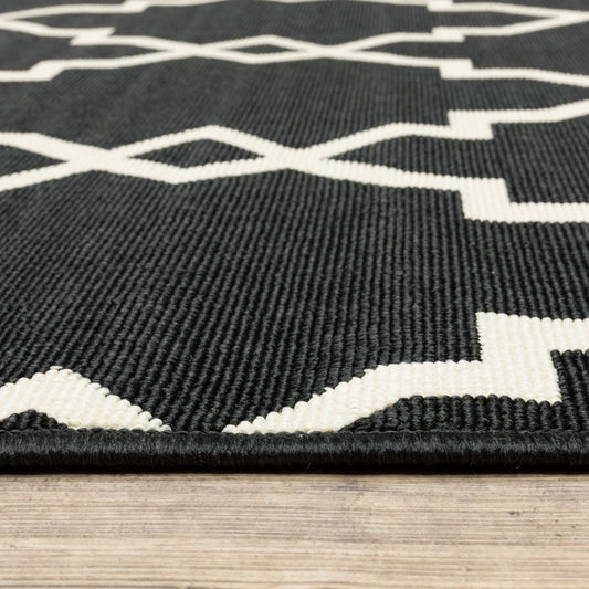 5' X 8' Black and Ivory Indoor Outdoor Area Rug