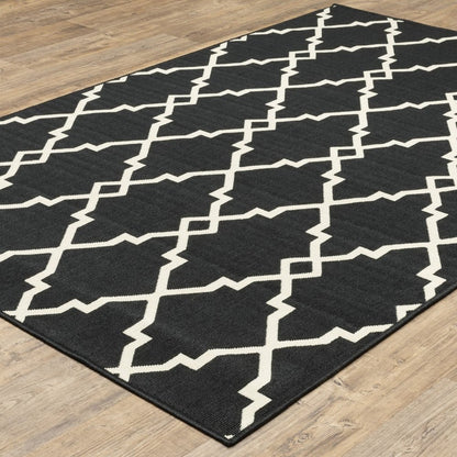 7' X 10' Black And Ivory Indoor Outdoor Area Rug
