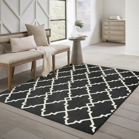 2' X 4' Black and Ivory Indoor Outdoor Area Rug