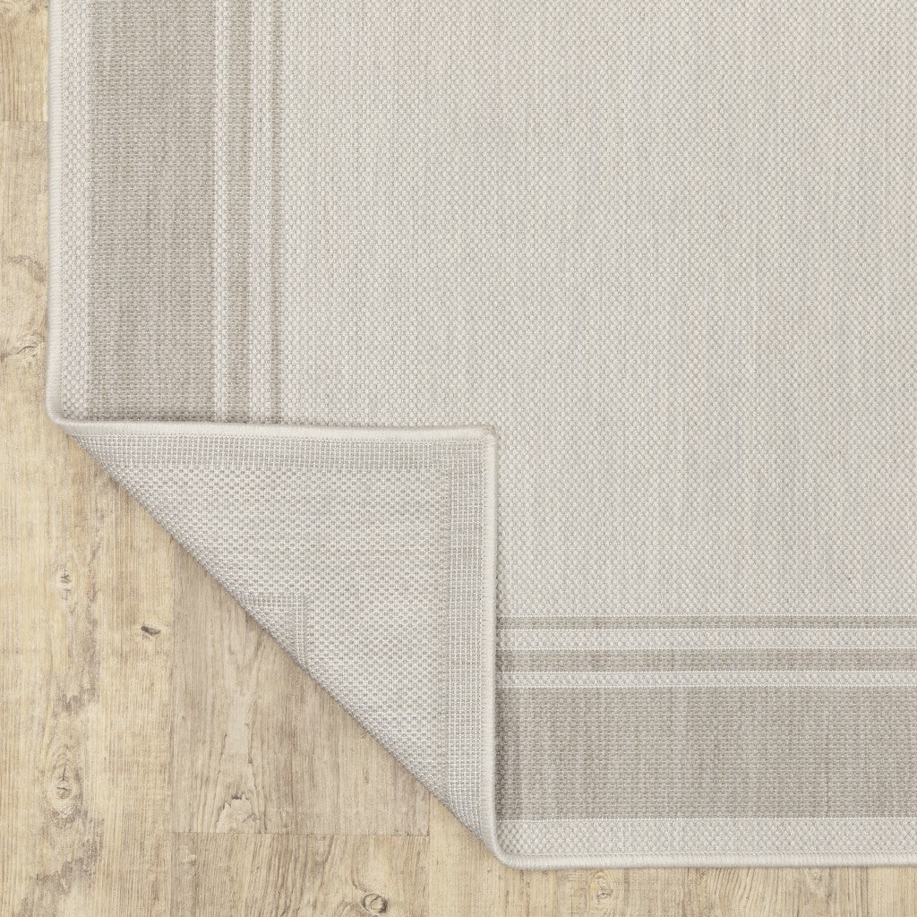 7' X 9' Gray and Ivory Indoor Outdoor Area Rug