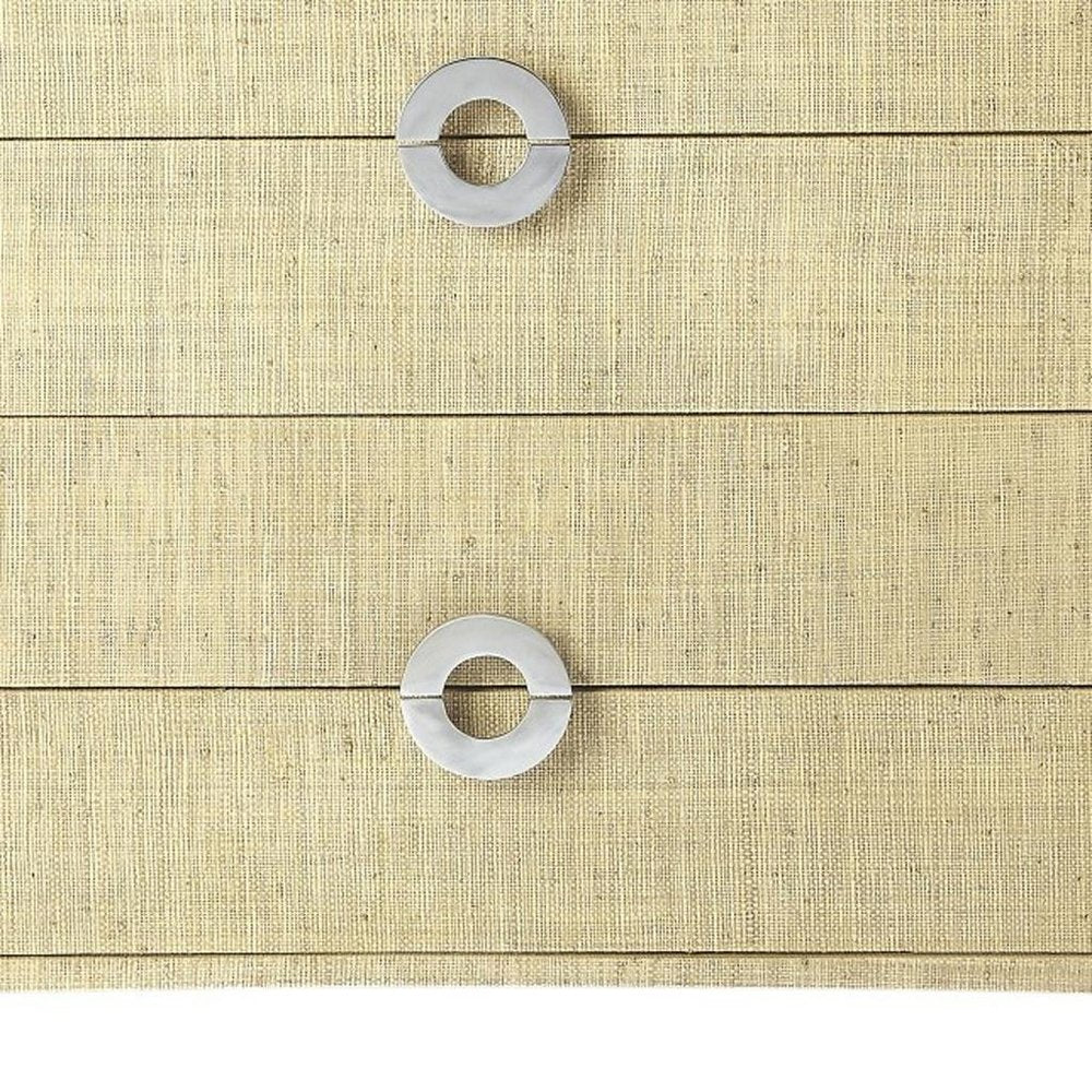 Beige manufactured wood four-drawer chest, 34-inch wide.