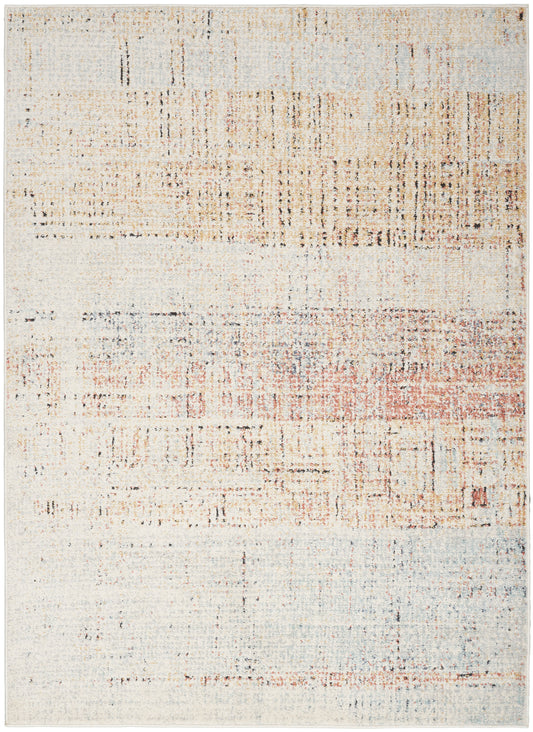 Rectangular abstract distressed area rug in cream, pale blue and peach with rust accents; modern, soft woven feel.