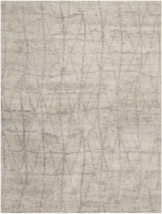 Muted beige-gray area rug with a subtle distressed geometric lattice of triangles; textured woven surface.