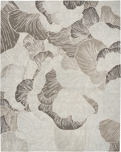 Neutral-toned rug featuring an abstract botanical leaf pattern in cream, taupe and brown; soft woven texture.