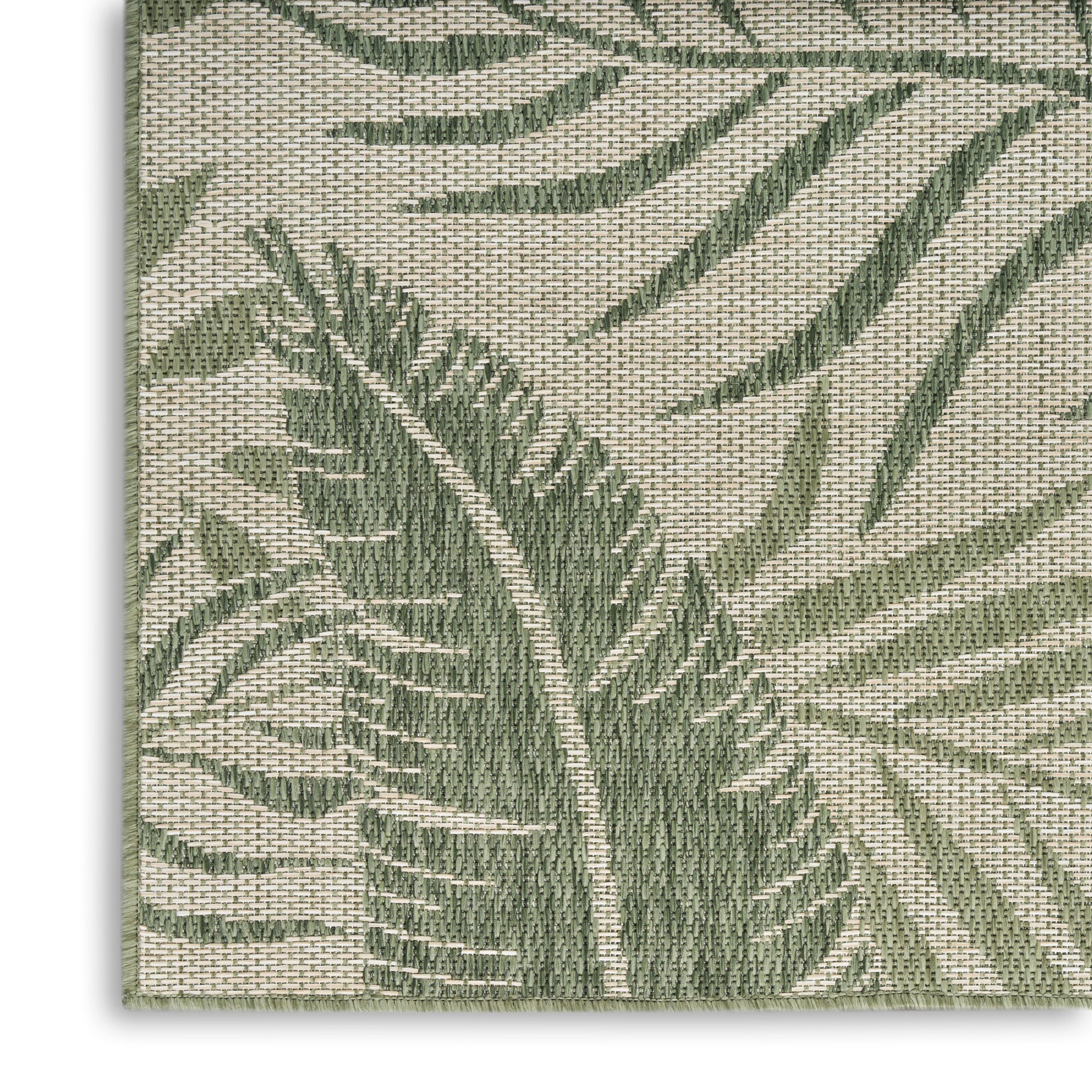 Beige woven rug with olive green palm leaf motif; tropical botanical pattern, durable textile floor decor.