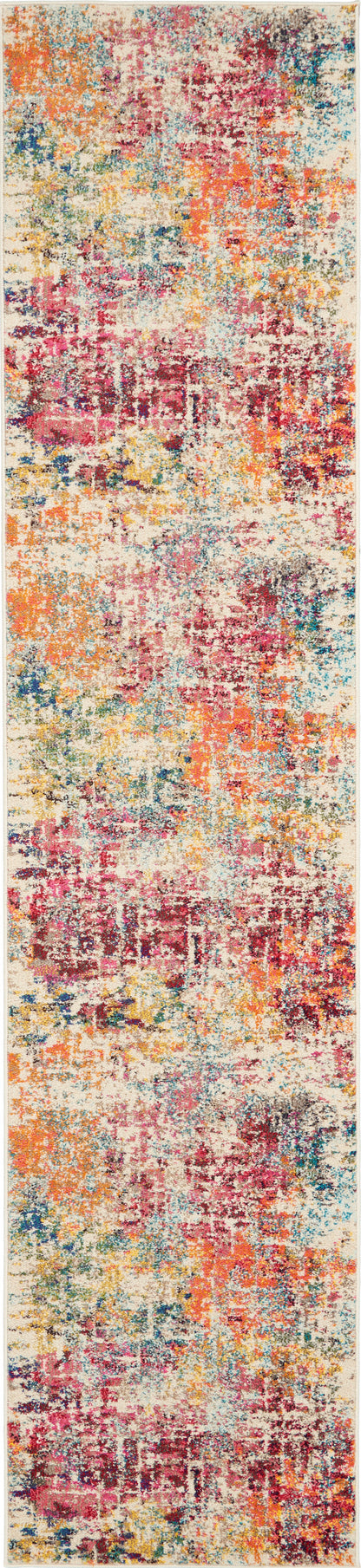Rectangular runner rug with a distressed abstract pattern in pink, orange, teal, yellow and beige.