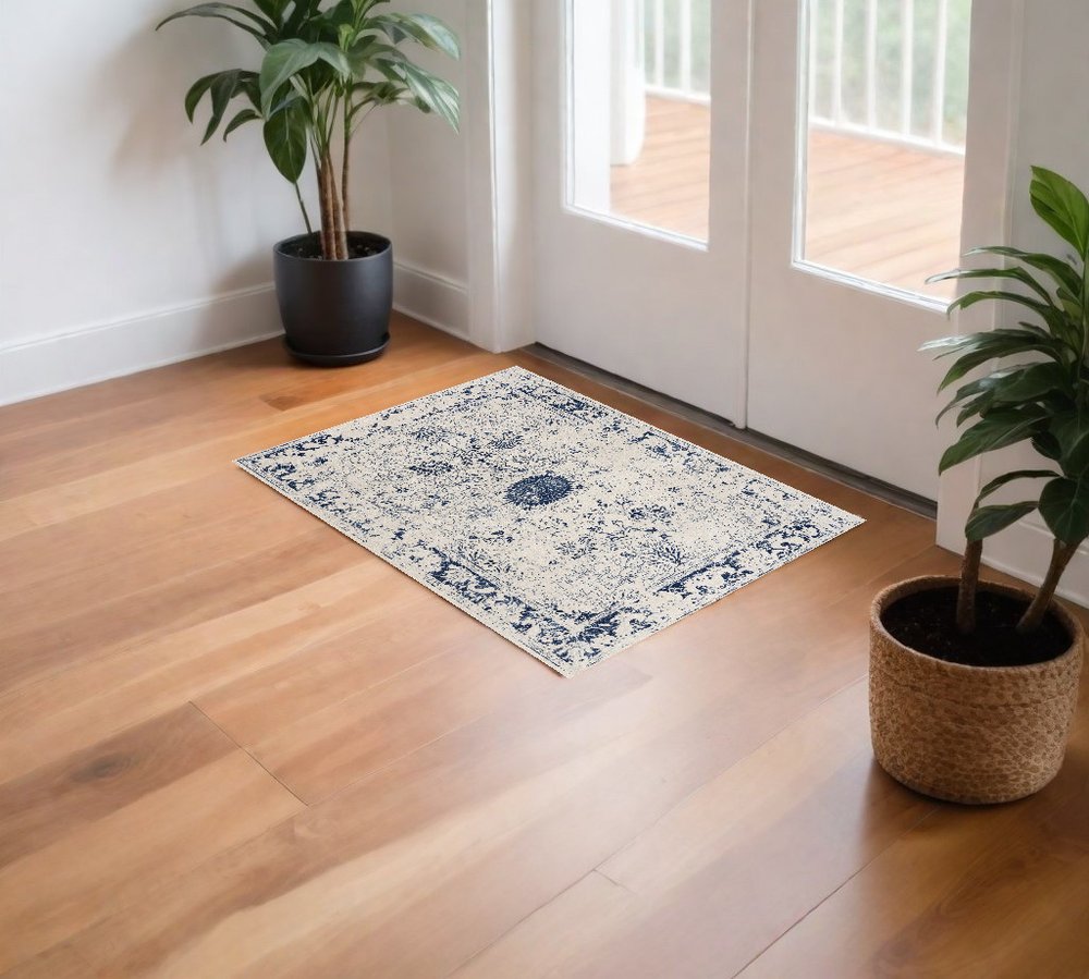 8' X 11' Navy Blue Distressed Floral Area Rug