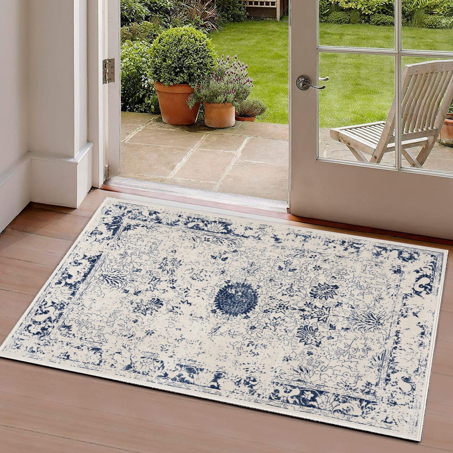 4' X 6' Navy Blue Distressed Floral Area Rug