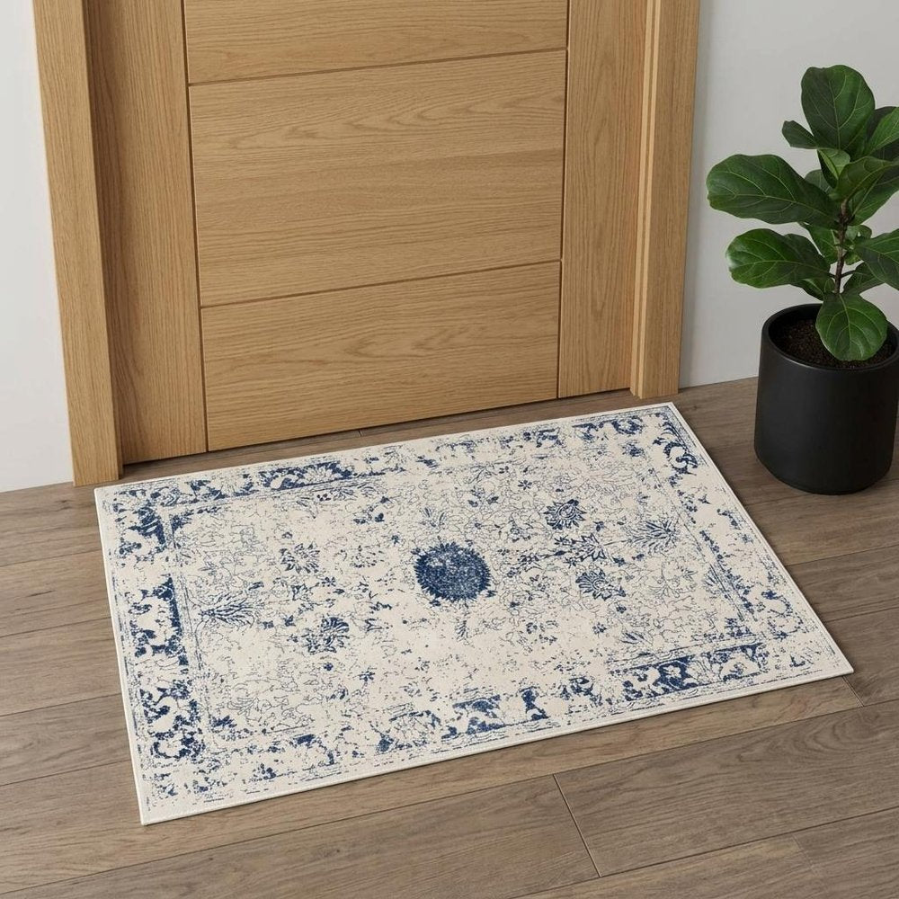 5' X 8' Navy Blue Distressed Floral Area Rug