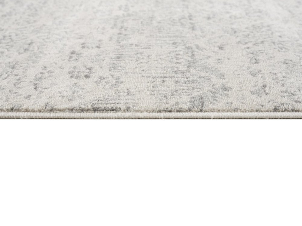 8' X 11' Ivory Distressed Ikat Pattern Area Rug
