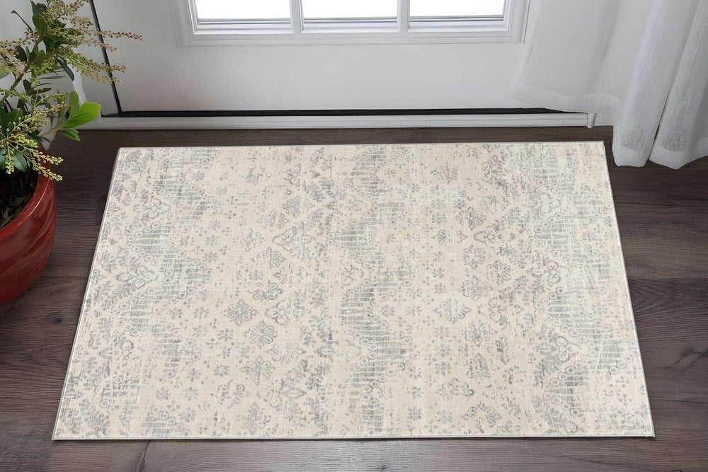 5' X 8' Ivory Distressed Ikat Pattern Area Rug